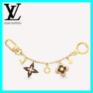 Louis Vuitton blooming flowers bag charm. Receipt.